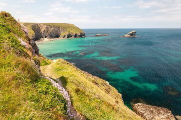 Newquay is a vibrant seaside town in England, renowned for its sandy beaches, stunning coastal cliffs, world-class surfing, and lively atmosphere, making it a top destination for holidaymakers.