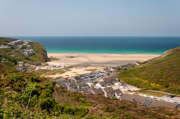 Newquay is a vibrant seaside town in England, renowned for its sandy beaches, stunning coastal cliffs, world-class surfing, and lively atmosphere, making it a top destination for holidaymakers.