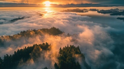 Aerial view of a stunning sunrise above misty hills and trees with vibrant colors reflecting on the clouds and landscape.