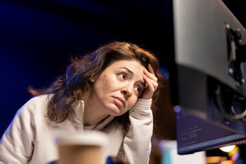 Worried system administrator stressed after finding many security vulnerabilities, scared of...