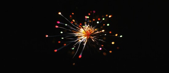 Obraz premium Vibrant colorful fireworks bursting in the night sky creating a festive atmosphere against a dark backdrop for celebrations and events