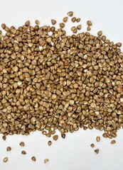 buckwheat, buckwheat groats, buckwheat on a white background, cereal, food, diet, products 