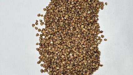 buckwheat, buckwheat groats, buckwheat on a white background, cereal, food, diet, products 