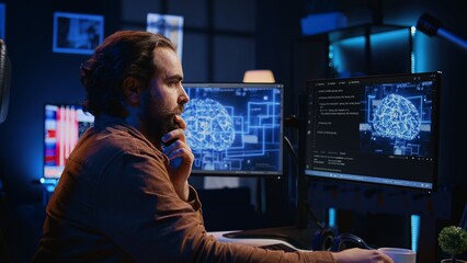 Computer scientist updating artificial intelligence neural networks, drinking coffee and writing code scripts in personal office. IT expert enjoying hot beverage while running AI simulations, camera B