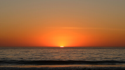 last moments of sunset over the sea