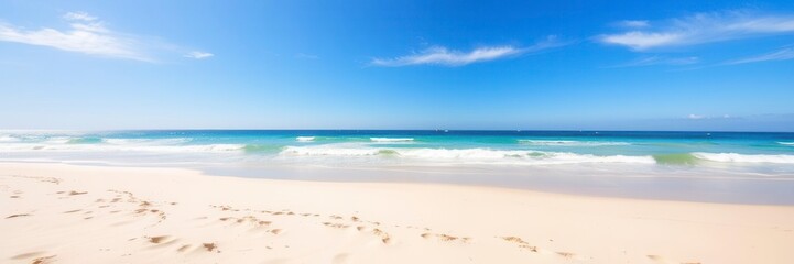 Obraz premium Scenic view of a pristine beach with crystal clear blue waters and golden sand dunes, beauty, escape, destination