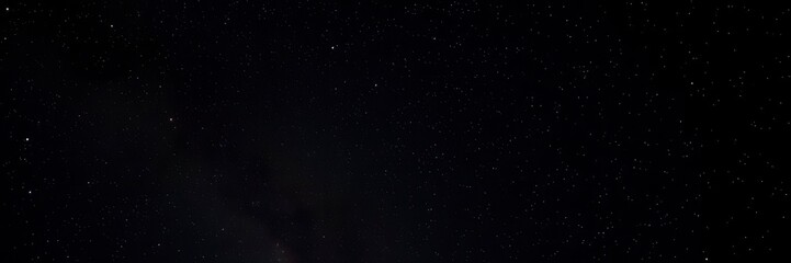 Obraz premium Starry night sky with sparkling stars on dark background, night sky, sparkling