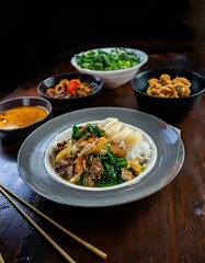 An array of appetizing Asian specialties, including Indian cuisine and Chinese food.