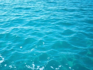 Obraz premium Blue turquoise ocean water with foamy waves, peaceful, ocean