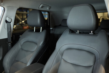 Car back seat with headrest and arm rest, a comfortable automotive fixture