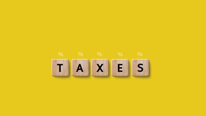 Tax concept on wooden cube. Income tax, savings, represent the concept tax return preparation and financial management, taxes planning. Finance, Money, Investment, Finance, Funds