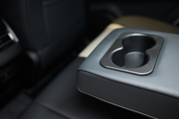 Vehicle armrest with cup holder, beige design, for luxury cars