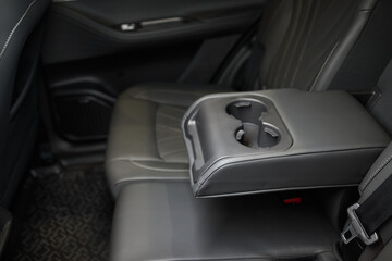 Vehicle armrest with cup holder, beige design, for luxury cars