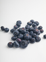 Heap of blueberries on white background