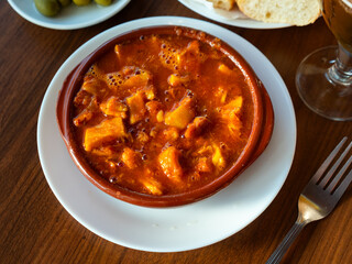 Traditional Spanish tripe dish Callos de ternera with tomato and paprika sauce