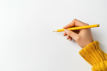 Close-up of hands writing with a yellow pencil on a white background, top view. Minimalist style.