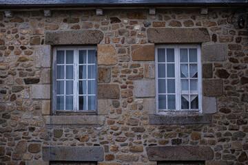 Mont Saint-Michel, Normandy, France, cloudy gloomy evening, sunset sky