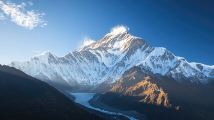 Majestic Snow-Capped Mountain Peaks Under Clear Blue Sky