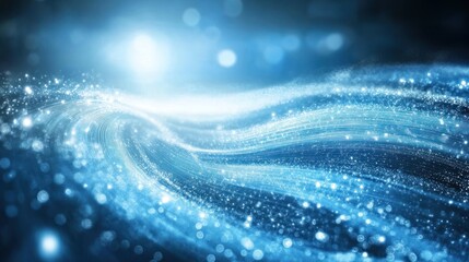 Fototapeta premium A shimmering blue wave of light and particles, evoking a sense of motion and tranquility.