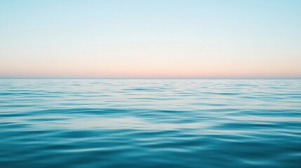 Obraz premium Serene Ocean Horizon at Dusk with Soft Blue and Pink Tones
