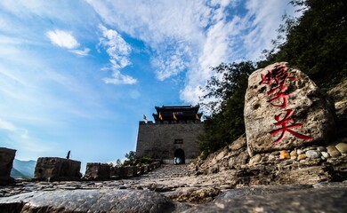 Exploring the Ninth Pass at the Great Wall of China under a blue sky