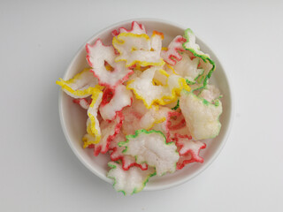 Crackers with shrimp flavor on white bowl