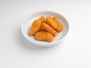 Chicken nugget in white bowl