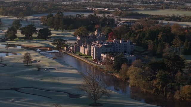 Adare Manor Hotel And Golf Course By The River Maigue In Adare, County Limerick, Ireland. - aerial shot