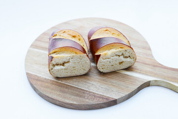 Plain Laugen bread on white background.