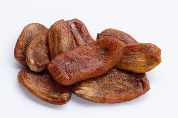 Sun dried bananas on white background.