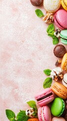 Colorful Macarons with Mint on Pink Background