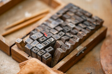 Vintage Crafting Tools for work with clay and Accessories Amidst a Rustic Table 