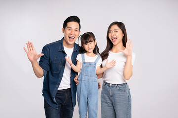 Fototapeta premium portrait of a happy asian family posing on a white background