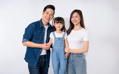 Fototapeta premium portrait of a happy asian family posing on a white background