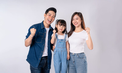 Fototapeta premium portrait of a happy asian family posing on a white background