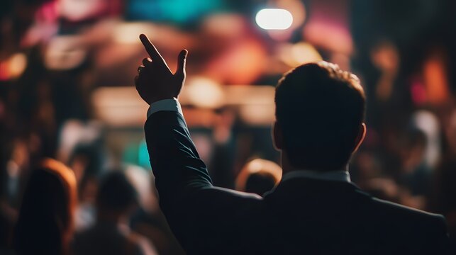 Auction house filled with enthusiastic bidders raising paddles in competitive bidding environment, showcasing the excitement and dynamics of auction culture