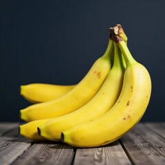 Bananas arranged in a pyramid shape on a wooden table, still life, composition