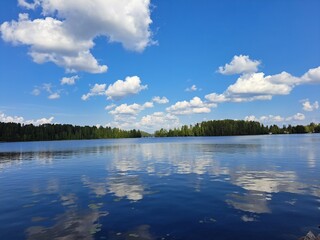 White clouds over a lake, Finland