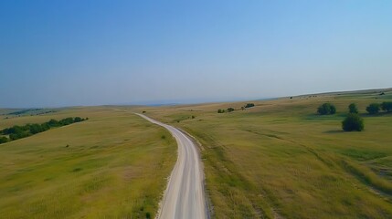 Aerial View: Winding Country Road Through Summer Fields. AI Generated