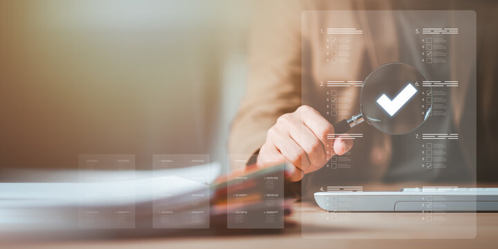 The man chooses the correct answer, marking online,online survey concept online exam filling out survey forms,using technology for education,learning assessment through online documents