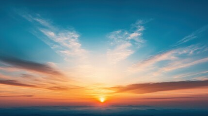 Obraz premium Breathtaking Sunrise Over Mountains with Colorful Sky and Clouds