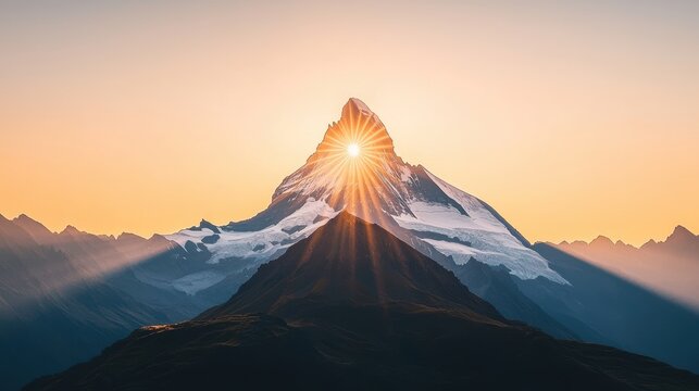A majestic mountain peak bathed in the warm glow of the setting sun, the sun rays creating a starburst effect behind the silhouetted peak.