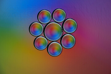 Abstract rainbow circles in geometric arrangement