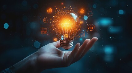 Innovative Light Bulb Concept Illustrating Business Ideas and Growth Potential with Glowing Elements in Hand Against a Dark Background