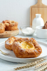 Danish pastry with icing sugar.