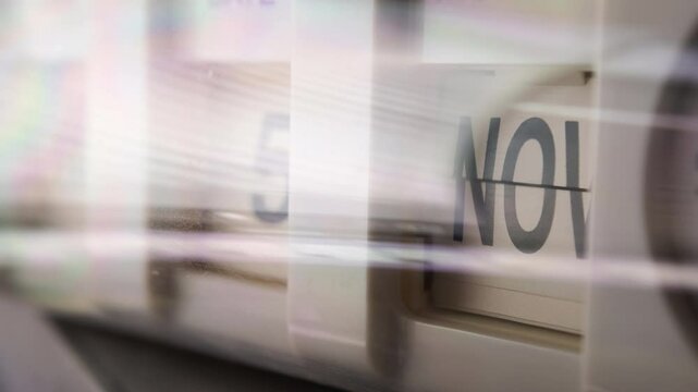 Futuristic time-lapse white flip calendar clock in speed light trail in 1 year