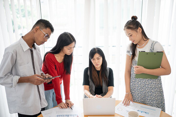 Business people group diverse colleagues team discuss project in  bright modern office Startup Diversity Teamwork Brainstorming.