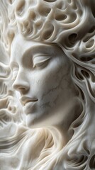 Close-up view of detailed marble relief showcasing intricate facial features and flowing hair design