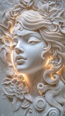 Obraz premium Intricate marble relief showcasing a serene female figure surrounded by floral motifs and soft lighting