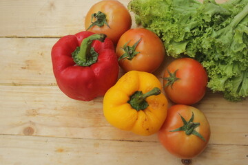 fresh vegetables on wooden table